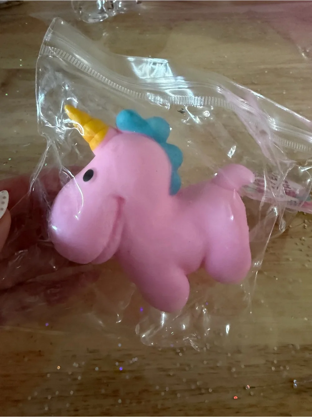 Pink Unicorn Squishy Toy with Yellow Horn and Blue Mane